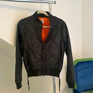 NSF hunter green puff jacket with orange lining. Size M